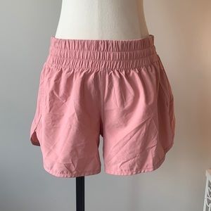Pink lulu track that size 12 high rise short